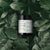 Product shot of ReSurface – Exfoliating Face Mask on leaf background